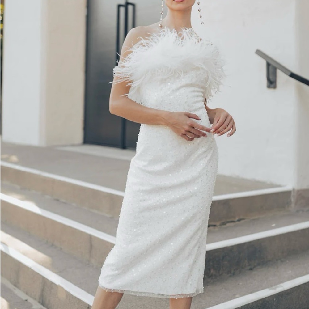 Untamed Petals dress. Worn twice. professionally dry cleaned. perfect condition